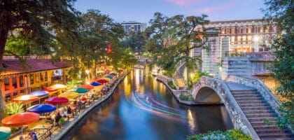 Evening view of San Antonio River Walk during high pollen season.